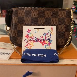 Louis Vuitton mini pochette in Damier Ebene